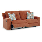 87" Manual Reclining Sofa - Spice Orange Polyester, Tufted Back, Zero Wall Design, 2 Pillows